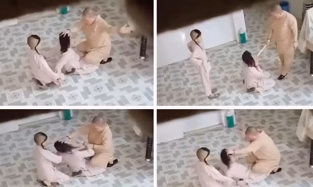 Sư cô tát liên tiếp vào mặt bé gái. Ảnh cắt từ Clip.