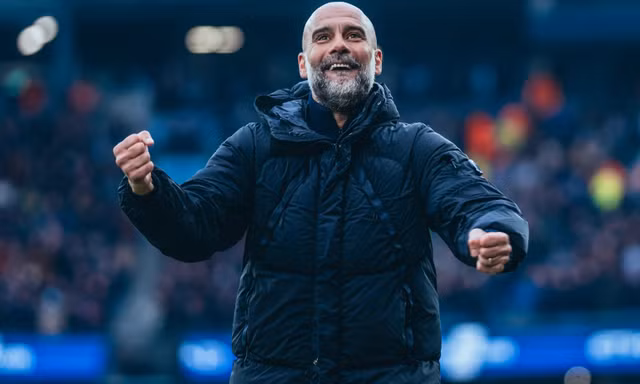 HLV Pep Guardiola.