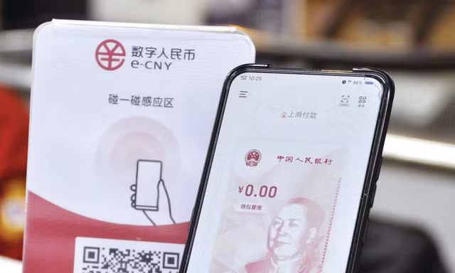 Đồng nhân dân tệ kỹ thuật số được đánh giá là một trong những sáng kiến tiên tiến nhất thế giới. Ảnh: Kyodo 