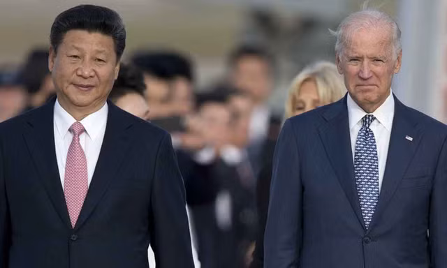 Tổng thống Mỹ Joe Biden (phải) và Chủ tịch Trung Quốc Tập Cận Bình. Ảnh: Xinhua