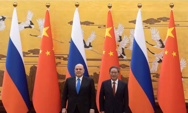 Thủ tướng Nga Mikhail Mishustin trong cuộc gặp Thủ tướng Trung Quốc Lý Cường tại Bắc Kinh ngày 24/5Ảnh: Reuters
