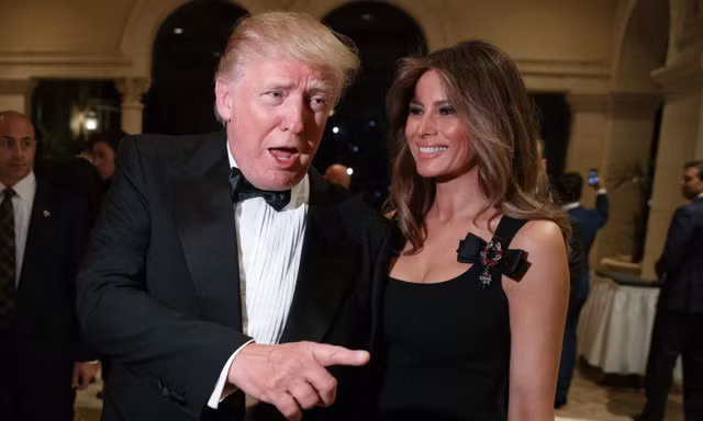 Tổng thống đắc cử Donald Trump và bà Melania Trump ngày 31/12/2016. Ảnh: AP. 