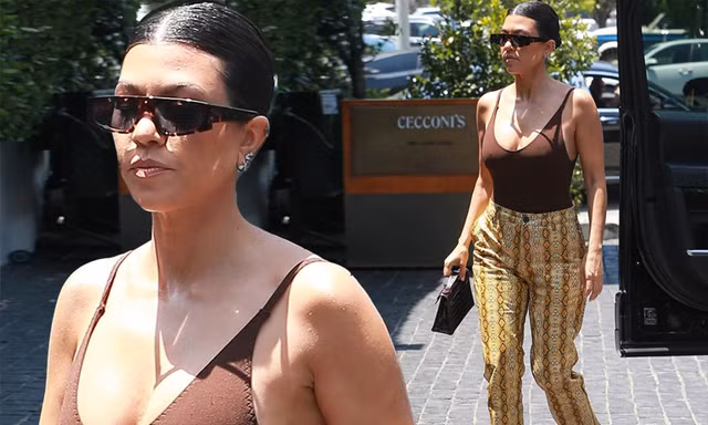 Chị cả nhà Kardashians ‘thả rông’ vòng 1 với áo 2 dây mỏng dạo phố