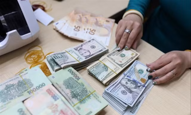 Tỷ giá tăng có lợi ngắn hạn cho doanh nghiệp xuất khẩu Ảnh: Như Ý 