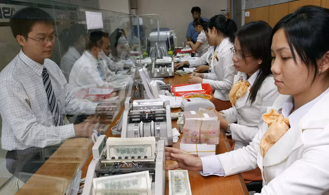 Tỉ giá năm nay sẽ tăng 1 hay 2% ?. Ảnh: Như Ý