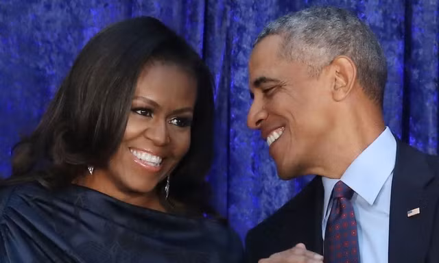 Ông Obama hiếm hoi xuất hiện cùng vợ