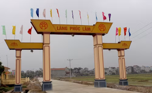 Ngôi làng nằm ven sông Đáy có tập tục đi ăn cỗ không bao giờ phải mời. Ảnh: Hoàng Phương.