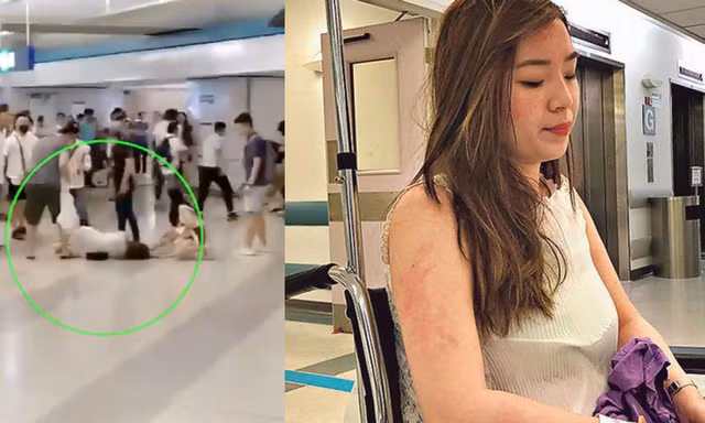 Bức ảnh người phụ nữ mang bầu nằm trên sàn nhà ga ở Hong Kong. (Ảnh: SCMP)