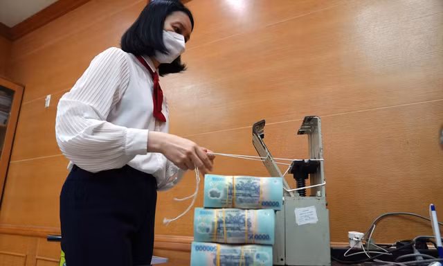 Nhiệm vụ giải ngân 700.000 tỷ đồng đầu tư công năm 2023 là rất nặng nề. Ảnh: Như Ý