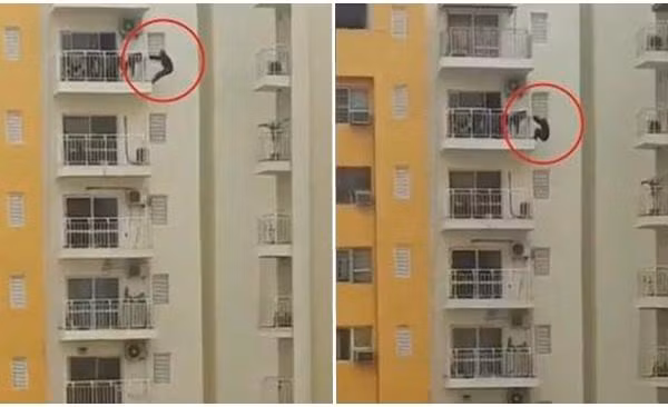 Một người Ấn Độ tập thể dục bằng cách đu bên ngoài ban-công tầng 12, ai nhìn cũng hoảng