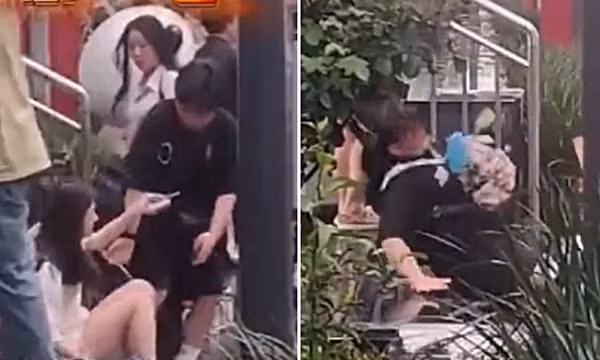 Trời mưa lớn biến cầu thang thành "cầu trượt" ở một ga tàu tại Trung Quốc