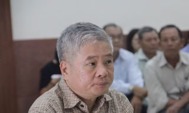 Nguyên phó Thống đốc Đặng Thanh Bình tại tòa sáng nay. Ảnh: Tân Châu