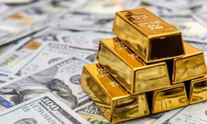 Đồng USD tăng mạnh gây sức ép lên giá vàng. Ảnh minh hoạ 