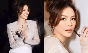 Lý Nhã Kỳ diện váy trắng quyến rũ, đeo trang sức 20 tỉ tham dự show thời trang