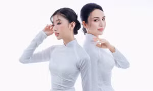 Hoa hậu Ngọc Diễm diện áo dài trắng, khoe nét tinh khôi bên cạnh một nhân vật đặc biệt sở hữu nhan sắc không hề kém cạnh