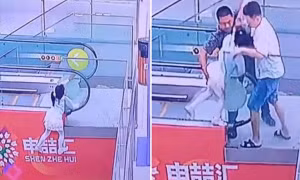 Người đàn ông cứu bé gái lơ lửng ở thang cuốn nhưng bị chỉ trích vì “để tay không đúng chỗ”