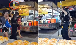 Cô gái đang truyền dịch vẫn ra chợ đêm ăn vặt, còn có người bạn cầm chai dịch đi cùng