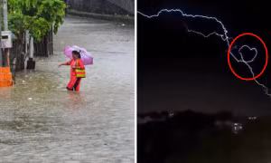 Tia sét kỳ ảo trong mưa: Sét đánh ngang bầu trời, uốn lượn tạo thành hình trái tim