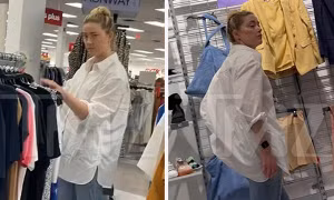 Hết tiền, Amber Heard đi mua đồ giảm giá nhưng thái độ vẫn thách thức Johnny Depp