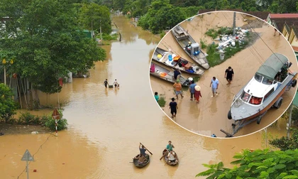 Lũ trên sông Lam dâng cao, quốc lộ hóa sông, người dân chèo thuyền sơ tán tài sản