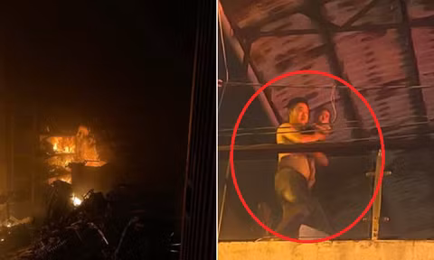 Đại úy công an băng qua 'biển lửa', cởi áo che chắn cho cháu bé 18 tháng tuổi