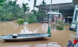 Nhiều nhà dân ở xã Tiên Lục bị ngập trong nước lũ.