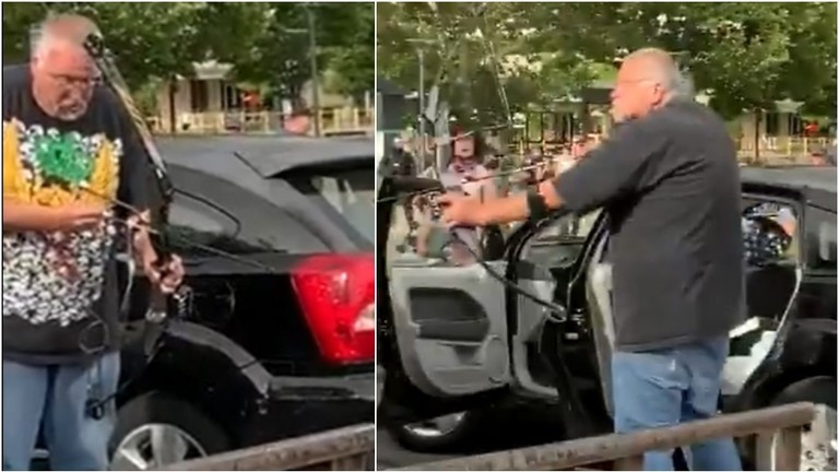 Tài xế giương cung về phía người biểu tình. 