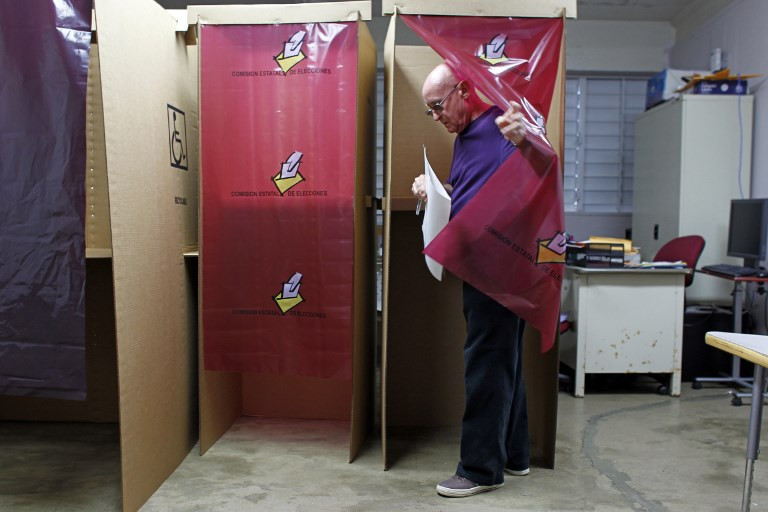 Người dân Puerto Rico tham gia trưng cầu hôm 11/6. Ảnh: AFP