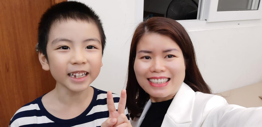 Chị Huế cùng con trai. Ảnh: F.B