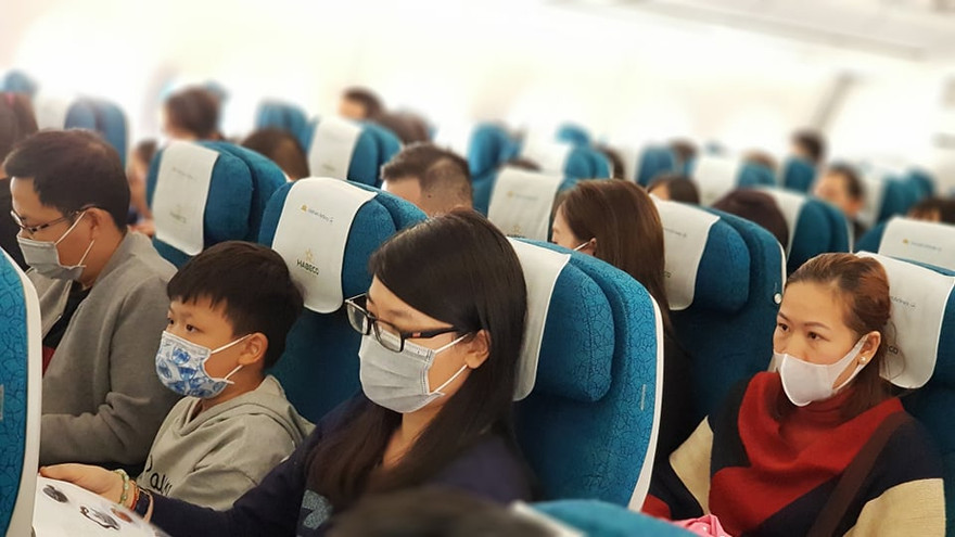 100% hành khách sử dụng khẩu trang trên máy bay. Ảnh: M.Đ