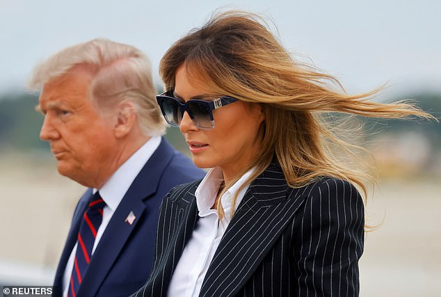 Bà Melania và ông Trump xuất hiện ngày 29/9 trước cuộc tranh luận với ông Biden. Ảnh: Reuters