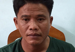 Nghi phạm Tân tại cơ quan công an. Ảnh:. N.T.