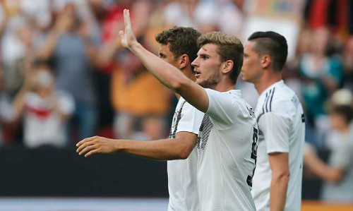 Werner mừng bàn mở tỷ số. Ảnh: AFP.