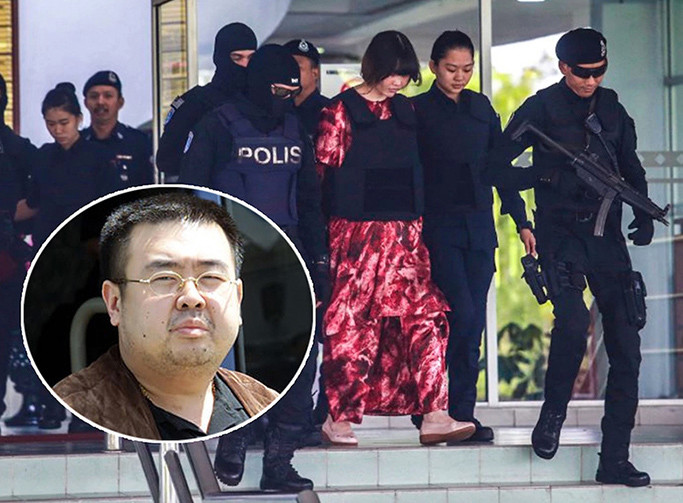 Nghi phạm Đoàn Thị Hương (áo đỏ) rời tòa. Ảnh: NST