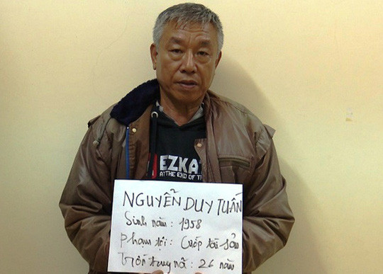 Nguyễn Duy Tuấn tại cơ quan công an.