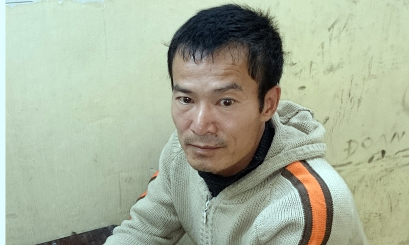 Nguyễn Quang Tuấn tại cơ quan công an.