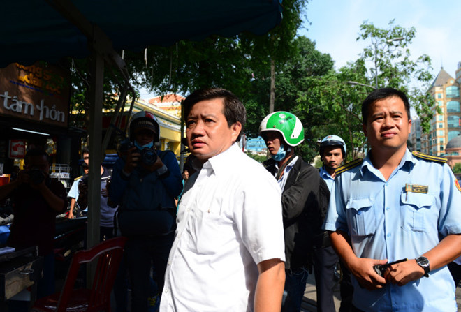 Ông Đoàn Ngọc Hải vẫn làm việc bình thường sau khi có đơn xin từ chức. Ảnh: Tùng Tin.