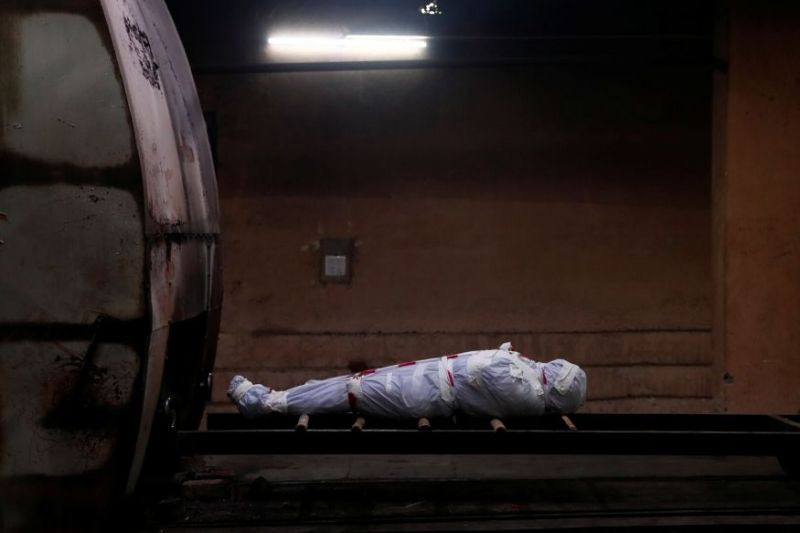 Thi thể nạn nhân tử vong vì COVID-19 ở Ấn Độ. Ảnh: Reuters