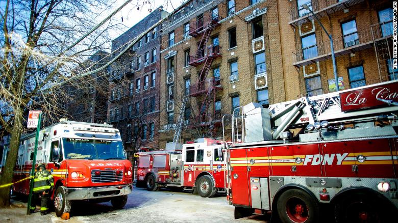 Hiện trường vụ cháy sau một đêm. Ảnh chụp sáng 29/12. Ảnh: AFP 