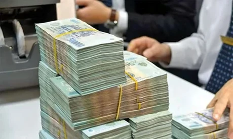 Vì sao nhiều người mang tiền gửi ngân hàng? 