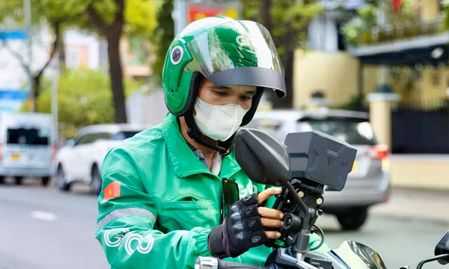 Lùm xùm phí Grab cao, cần siết lại ‘luật chơi’?