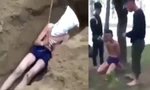 Hình ảnh nam thanh niên bị nhóm người tra tấn, hành hung