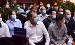 Các bị cáo và người liên quan tại toà.