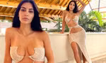 Kim Kardashian để mặt mộc, mặc váy cắt khoét gần hết thân trên hút triệu like