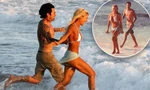 Lily James ‘bốc lửa’ với bikini khi tái hiện đám cưới trên bãi biển của cựu mẫu Playboy