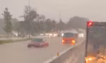 Mưa lớn tại Bình Dương, đường hóa sông, cây gãy đè xe máy