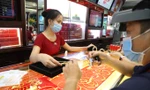 Giá vàng trong nước tăng mạnh khi có thông tin dịch COVID-19 bùng phát Ảnh: Như Ý