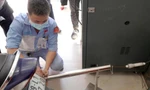 Tháng 11/2021, các đại lý bảo dưỡng xe máy chính hãng tại Hà Nội thí điểm đo khí thải Ảnh: Duy Phạm