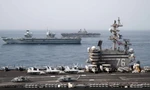 Tàu sân bay Anh Queen Elizabeth, tàu sân bay Mỹ USS Ronald Reagan và tàu tấn công đổ bộ USS Iwo Jima phối hợp trên Vịnh Aden ngày 12/7Ảnh: US Navy