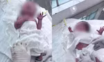 Bé gái sơ sinh bị bỏ rơi bên bờ sông Tắc